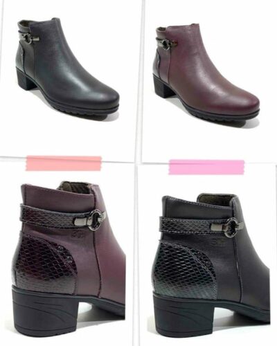 Botines de mujer en color negro y burdeos, con diseño elegante y tacón medio. Detalles en piel y hebilla decorativa, ideales para el uso diario y ocasiones especiales.