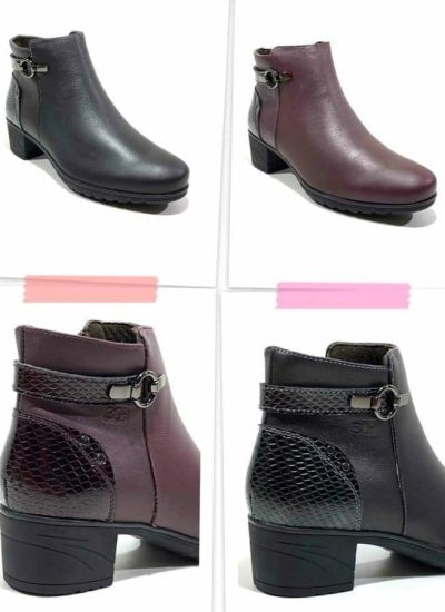 Botines de mujer en color negro y burdeos, con diseño elegante y tacón medio. Detalles en piel y hebilla decorativa, ideales para el uso diario y ocasiones especiales.